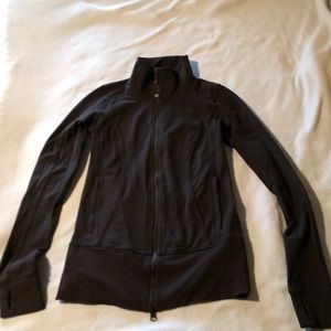 The Lululemon jacket comes down to just below butt